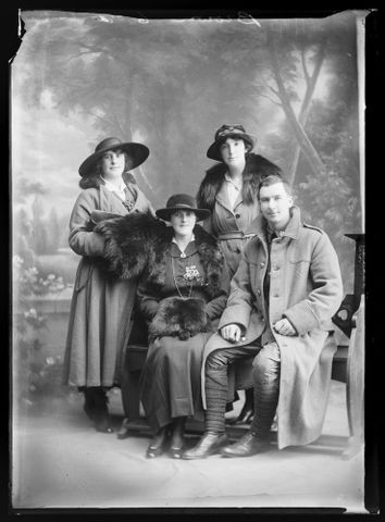 Portrait of an unidentified soldier and three unidentified women inscribed Brown, 1914-1919, Wellington. Berry & Co. Purchased 1998 with New Zealand Lottery Grants Board funds. Te Papa