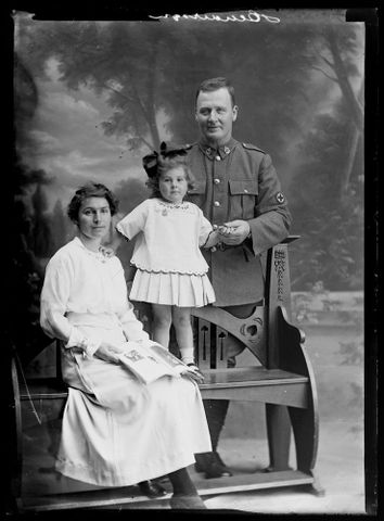 Group portrait of an unidentified soldier, an unidentified woman and an unidentified girl inscribed Henderson, 1914-1919, Wellington. Berry & Co. Purchased 1998 with New Zealand Lottery Grants Board funds. Te Papa