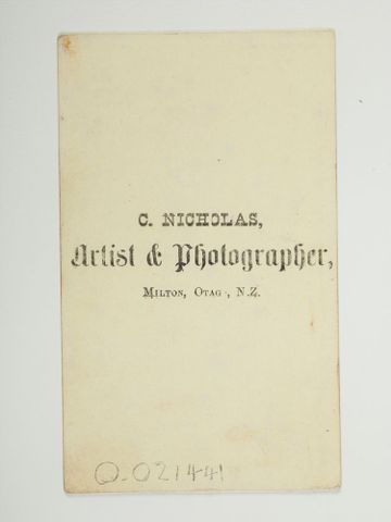 Back of photograph that says C Nicholas, artist and photographer