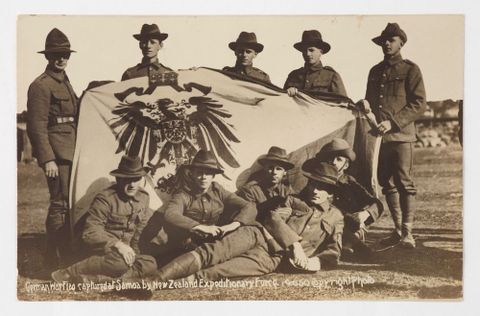 Postcard, ’German War Flag captured at Samoa by New Zealand Expeditionary Force’, 1914-1916, New Zealand, by William Wilson. Purchased 2011. Te Papa (GH023107)