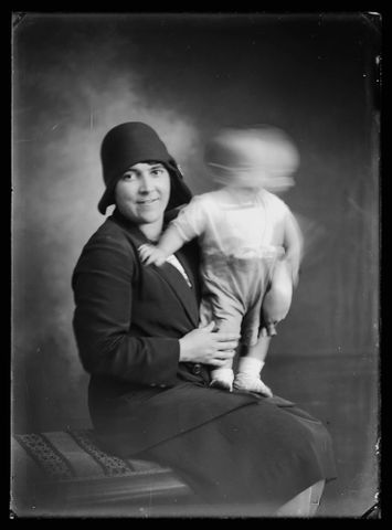Woman holding infant boy, circa 1927-28, Wellington. Berry & Co. Purchased 1998 with New Zealand Lottery Grants Board funds. Te Papa